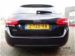 Peugeot 308 SW - 1.2 e-THP Blue Lease Executive Navigatie Achteruitrijcamera Cruise control Btw auto - 1 - Thumbnail