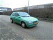 Opel Corsa - 1.4i Strada - 1 - Thumbnail