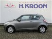 Suzuki Swift - 1.2 Comfort EASSS Tot 10 jaar garantie - 1 - Thumbnail