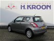 Suzuki Swift - 1.2 Comfort EASSS Tot 10 jaar garantie - 1 - Thumbnail