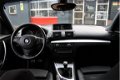 BMW 1-serie - 118i Business Line M-Sport / Navigatie / Xenon / Leder - 1 - Thumbnail