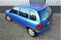 Opel Corsa - 1.0i 12V Strada 5 deurs | APK 16-12-2020 | - 1 - Thumbnail