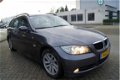 BMW 3-serie Touring - 320d Airco I LMV I PDC I Navi I Elec ramen v/a I Cruise Control I Trekhaak - 1 - Thumbnail