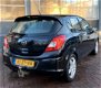 Opel Corsa - 1.3 CDTi Cosmo airco, cruise control, radio cd-speler, lichtmetaal - 1 - Thumbnail