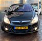 Opel Corsa - 1.3 CDTi Cosmo airco, cruise control, radio cd-speler, lichtmetaal - 1 - Thumbnail