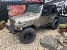 Jeep Wrangler - 4.0i AUTOMAAT *SMOKEGREY OUTLAW