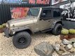 Jeep Wrangler - 4.0i AUTOMAAT *SMOKEGREY OUTLAW - 1 - Thumbnail
