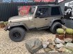 Jeep Wrangler - 4.0i AUTOMAAT *SMOKEGREY OUTLAW - 1 - Thumbnail