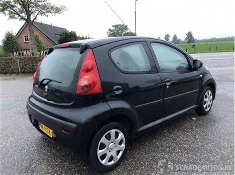 Peugeot 107 - 1.0i 12v 68pk millesim 5drs - airco - elektr ramen - radio - 1e eig. - org nl + nap - - 1