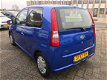 Daihatsu Cuore - 1.0-12V 100th Anniversary / 2e eigenaar - 1 - Thumbnail