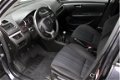 Suzuki Swift - 1.2 5-Deurs Exclusive / Clima / Cruise Control - 1 - Thumbnail