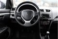 Suzuki Swift - 1.2 5-Deurs Exclusive / Clima / Cruise Control - 1 - Thumbnail