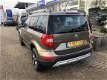 Skoda Yeti Outdoor - 1.4 TSI Ambition | Navigatie | Cruise controle | Automaat | Winterbanden | - 1 - Thumbnail