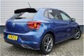 Volkswagen Polo - 1.0TSI/96PK Highline R · Front assist · R-Line · Stoelverwarming - 1 - Thumbnail