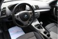 BMW 1-serie - 116i High Executive AIRCO /CRUISE /PDC /NWE APK - 1 - Thumbnail