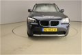 BMW X1 - XDrive 2.0I Navigatie / Clima / GSM / PDC / Spiegelpakket / Alu 17 inch - 1 - Thumbnail