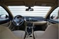 BMW X1 - sDrive18d Business+ | X-Line | Leder | Metallic | Trekhaak | Cruise - 1 - Thumbnail