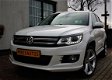 Volkswagen Tiguan - 1.4 TSI R-Line Edition 6 Mnd Garantie - 1 - Thumbnail