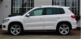 Volkswagen Tiguan - 1.4 TSI R-Line Edition 6 Mnd Garantie - 1 - Thumbnail