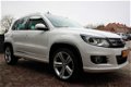 Volkswagen Tiguan - 1.4 TSI R-Line Edition 6 Mnd Garantie - 1 - Thumbnail