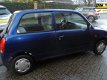 Daihatsu Cuore - 1.0-12V STi super nette auto nw apk slecht, s 59 dkm nap dealer onderhouden - 1 - Thumbnail