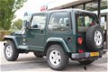 Jeep Wrangler - 4.0 I Sahara Hardtop & Softtop - 1 - Thumbnail