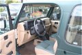 Jeep Wrangler - 4.0 I Sahara Hardtop & Softtop - 1 - Thumbnail