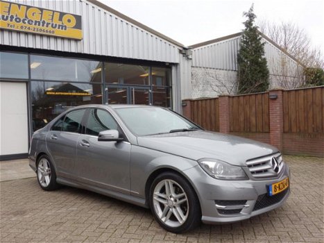 Mercedes-Benz C-klasse - 180 Ambition Avantgarde AMG-Pakket 156 Pk Airco Navi Xenon Pdc 111 dkm Nap - 1