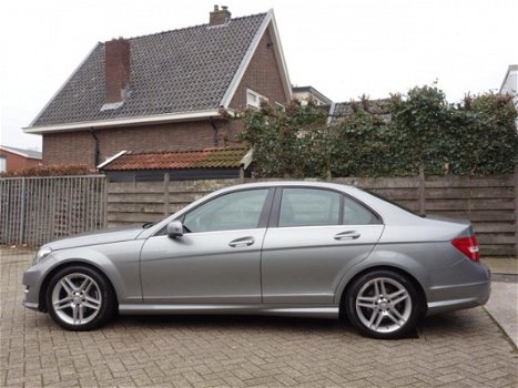 Mercedes-Benz C-klasse - 180 Ambition Avantgarde AMG-Pakket 156 Pk Airco Navi Xenon Pdc 111 dkm Nap - 1