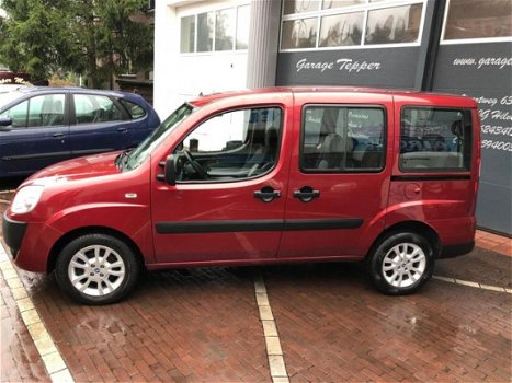 Fiat Doblò - 1.4 Family Plus 7 PERSOONS/AIRCO/NW APK/NAVI/TREKHAAK/PDC/LM VELG/DIS VV - 1