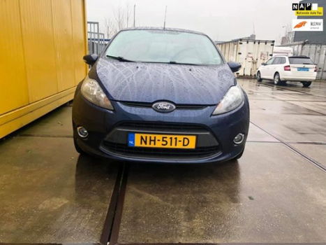 Ford Fiesta - 1.6 TDCi ECOnetic Titanium 1JAAR APK-AIRCO-5DRS-NAVIGATIE-NETTE AUTO - 1