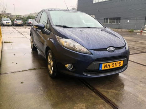 Ford Fiesta - 1.6 TDCi ECOnetic Titanium 1JAAR APK-AIRCO-5DRS-NAVIGATIE-NETTE AUTO - 1