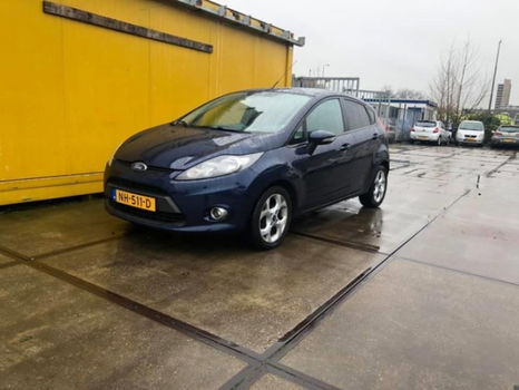 Ford Fiesta - 1.6 TDCi ECOnetic Titanium 1JAAR APK-AIRCO-5DRS-NAVIGATIE-NETTE AUTO - 1