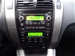 Hyundai Tucson - 2.0I CVVT STYLEVERSION 2WD - 162976 Km - Navi - Leer - Clima - 1 - Thumbnail