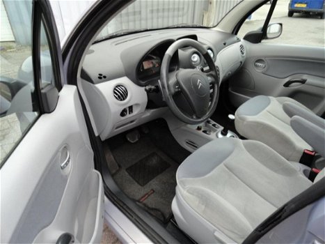 Nissan Primera - 1.8 Visia ( NAVI LEER CLIMA ACHTER CAMERA) - 1