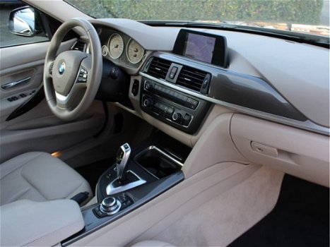 BMW 3-serie - 320i High Executive AUTOMAAT LEER / XENON / NAVIGATIE - 1