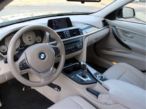 BMW 3-serie - 320i High Executive AUTOMAAT LEER / XENON / NAVIGATIE - 1