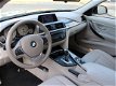 BMW 3-serie - 320i High Executive AUTOMAAT LEER / XENON / NAVIGATIE - 1 - Thumbnail