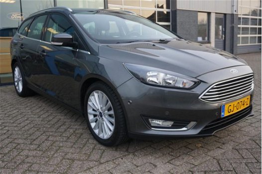 Ford Focus Wagon - 1.0 Titanium Edition Navi Climate Parkeersensoren Licht en Regensensore Isofix Cr - 1