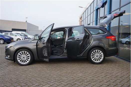 Ford Focus Wagon - 1.0 Titanium Edition Navi Climate Parkeersensoren Licht en Regensensore Isofix Cr - 1