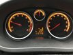 Opel Corsa - 1.2-16V Rhythm, AIRCO, BLUETOOTH, PARKSENSOR ACHTER - 1 - Thumbnail