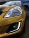 Suzuki Swift - 1.2 Dynamic EASSS Airco, Cruise control, LM velgen, Volledig dealeronderhouden - 1 - Thumbnail