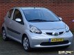 Toyota Aygo - 1.0 12v VVT-i + Airco/Elek Pakket/APK - 1 - Thumbnail