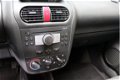 Opel Corsa - 1.2-16V Rhythm NIEUWE APK - 1 - Thumbnail