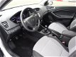 Hyundai i20 - 1.2 HP i-Motion Comfort *NAVIGATIESYSTEEM / CLIMATE CONTROL - 1 - Thumbnail