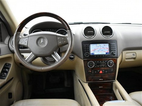 Mercedes-Benz M-klasse - 320 CDI + LUCHTVERING / SCHUIFDAK / HARMAN/KARDON / ELEKTR. KLEP / STOELVER - 1