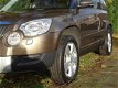 Skoda Yeti - 1.2 TSI Ambition Arctic met Navi-4 nieuwe banden - 1 - Thumbnail