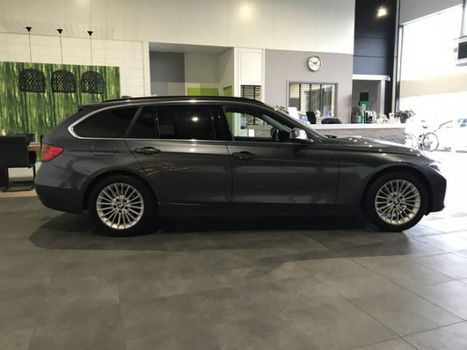 BMW 3-serie Touring - 318d Business Luxury Airco ECC | Navigatie | Stoelverwarming | Elektrische kle - 1