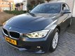 BMW 3-serie - 320i High Executive Automaat Navigatie Xenon 1e Eigenaar - 1 - Thumbnail