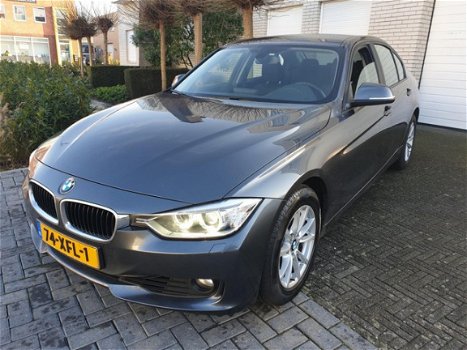 BMW 3-serie - 320i High Executive Automaat Navigatie Xenon 1e Eigenaar - 1